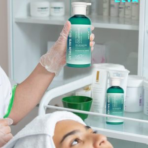 repair cream bottle on hands